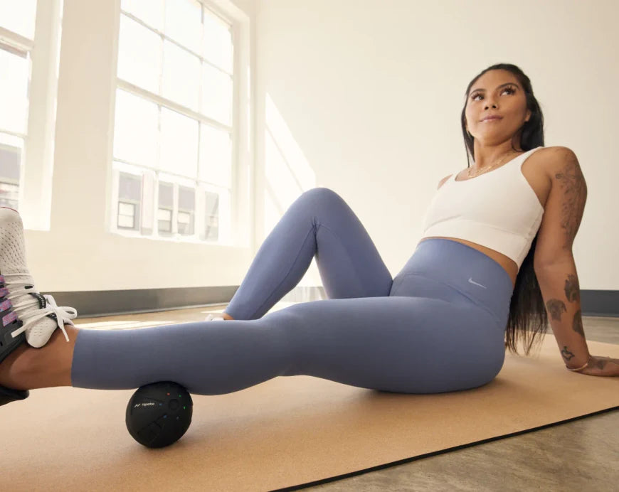 Hypersphere massage ball for muscle warm-up before activities.