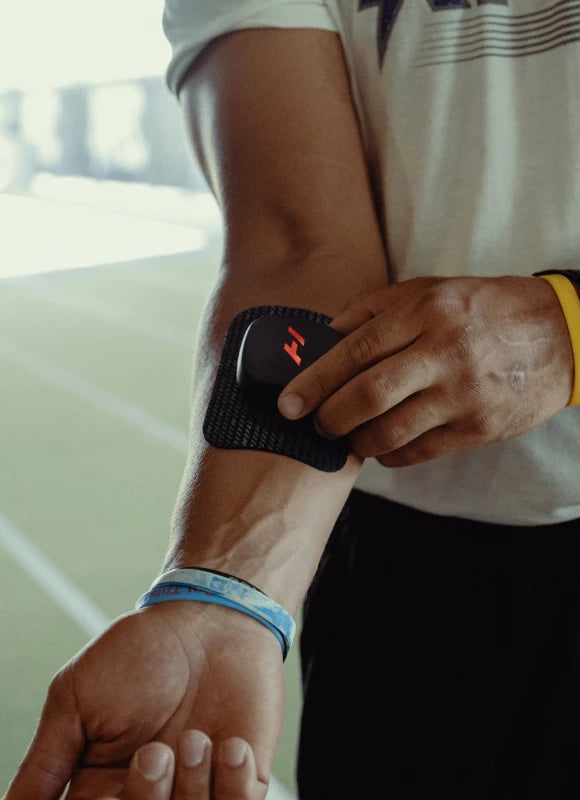 Robin Arzon using the VenomGo for muscle recovery on the go.
